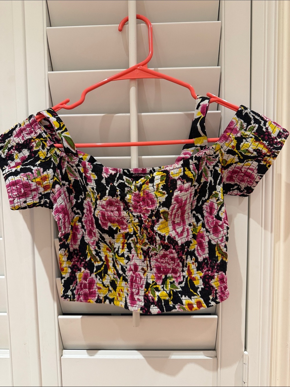 American Rag Pink Floral Smocked Off-Shoulder Crop Top on Black